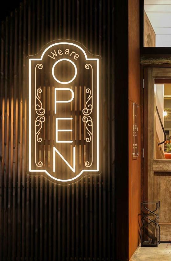 Neon "Open" sign glowing in studio